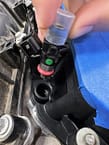 3.6 Pentastar injector upgrade being installed
