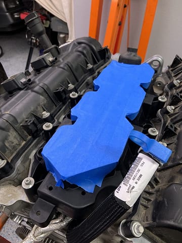 Manifold taped shut to protect engine internals