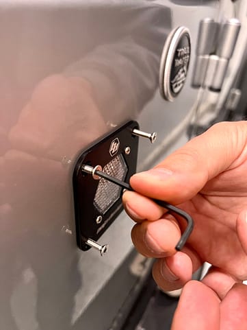 fastening the Jeep off road lights